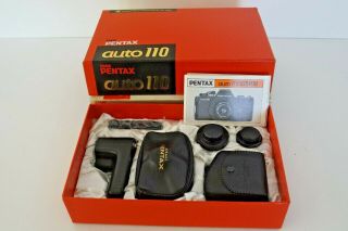 Vintage Pentax Auto 110 Camera System W/ Camera,  3 Lenses,  Flash & Winder Nib