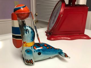 Vintage Collectable Tin Wind Up Seal With Ball -