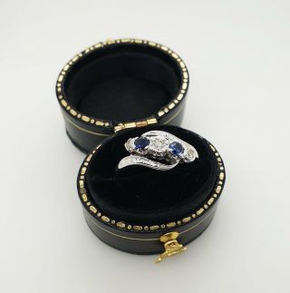 - Estate Platinum & 18k Yellow Gold Sapphire & Diamond Ring.