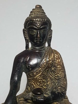 A Qing Dynasty Tibetan Chinese Gilt Bronze Buddha. 8