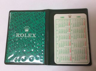Rolex Vintage 1980 Calendar Card,  Plastic Paper Holder,  Cert Booklet