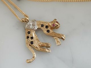 A Stunning 9 Ct Gold Sapphire Diamond And Ruby Leopard Pendant And Chain