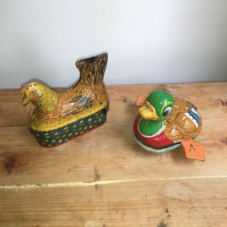 Antique Or Vintage Lithographed Tin Toys Hen On Nest And Crank Duck