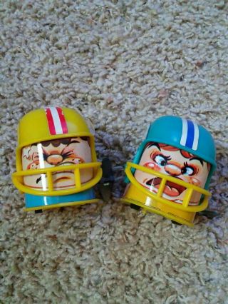 2 Rare Vintage Shudo Japan Toy Tin Windup Football Helmets.