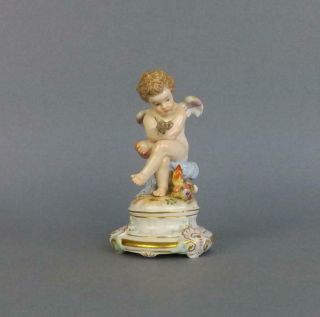 Antique Meissen Dresden Figurine Of A Cherub With A Heart Circa 19c