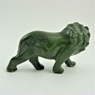 19th CENTURY CHINESE CARVED GREEN HARDSTONE FIGURE OF A LION 4