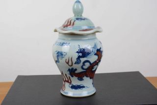 A Chinese Ming Dynasty Style Cobalt Blue Decorated Dragon Jar And Cover.