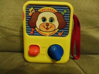 Vintage Shelcore Musical Radio Yellow Toy W/ Red Wristband