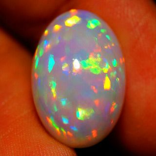 9.  90 Ct White Base Ethiopian Opal Electric Fire Aaa Quality Rare Gemstone