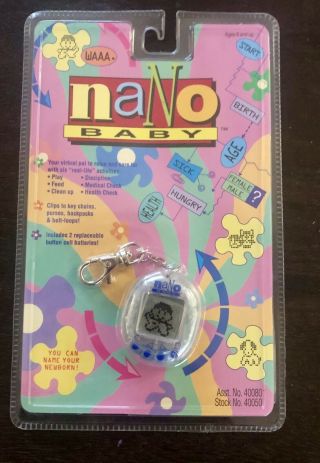 Nip - Rare - Clear Nano Baby Pet Virtual Playmates Vintage 1997.  Giga Pet