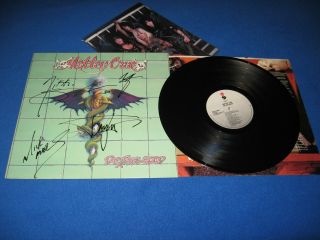 Motley Crue - Dr.  Feelgood Lp (ultra Rare Autographed By The Entire Band)