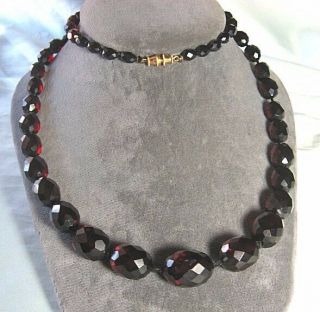 Hand Knotted & Faceted Cherry Bakelite / Amber Bead Necklace 32 1/2” Long