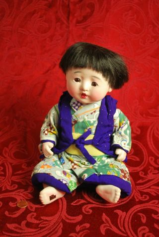 A Set A Vintage 1940s Japanese Ichimatsu Gofun Dolls With Glass Eyes