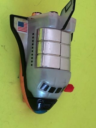 Vintage Tomy Wind Up Space Shuttle - Top Opens,  Astronaut Spins,