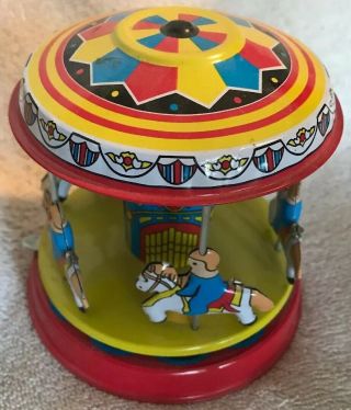 Vintage Red China Shanghai Merry - Go - Round Slide Lever Tin Toy