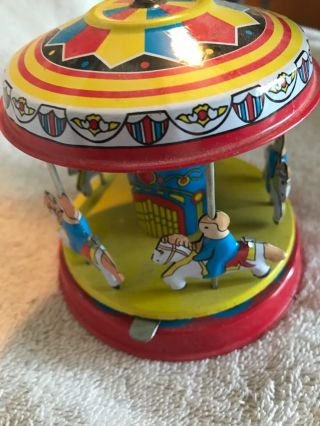 Vintage Red China Shanghai Merry - Go - Round Slide Lever Tin Toy 3