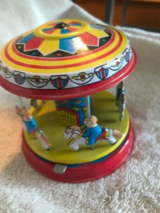 Vintage Red China Shanghai Merry - Go - Round Slide Lever Tin Toy 4
