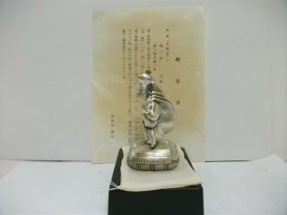 A god of wealth of the pure silver.  One of Japanese Seven Lucky Gods. 5