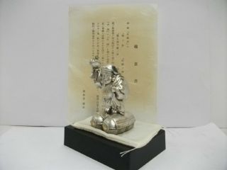 A god of wealth of the pure silver.  One of Japanese Seven Lucky Gods. 6