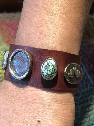 VINTAGE JES MAHARRY LEATHER CUFF WITH STERLING,  AMMONITE & TURQUOISE MEDALLIONS. 6
