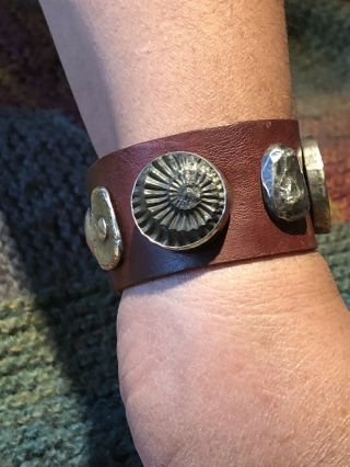 VINTAGE JES MAHARRY LEATHER CUFF WITH STERLING,  AMMONITE & TURQUOISE MEDALLIONS. 7