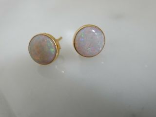 A Stunning 18 Ct Gold 5.  00 Carat Cabochon Opal Earrings