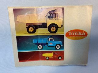 Set of 7 Vintage Tonka Catalogs Plus Bottom Dump Truck 7