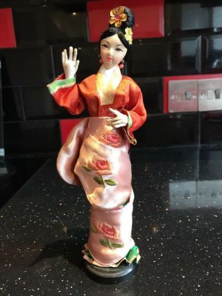 Vintage Geisha Girl Cloth Japanese Oriental Doll On Wooden Stand 10” Tall