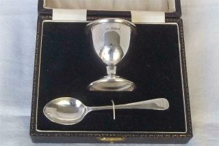 A Boxed Solid Sterling Silver Christening Set Egg Cup & Spoon Dates 1948 - 49.