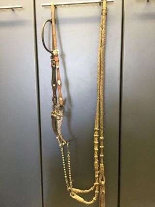 Vintage Silver Spade Bit,  Headstall And Rawhide Reins And Romel.