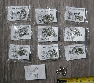 1 X Set Of 10 Mini Metal Puzzles Magic Tricks Wrapped & Uk Post