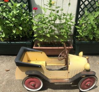 Vintage Yellow Pedal Car With Red Wheels