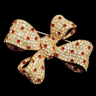 Signed Ciner Figural Bow Brooch With Clear & Red Rhinestones