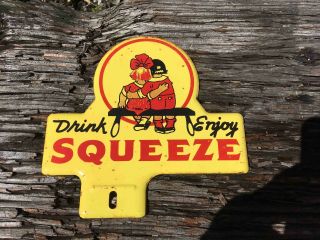 Vintage Drink & Enjoy Squeeze Orange Soda Advertising License Plate Topper Sign