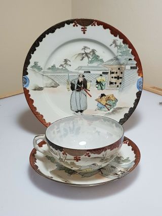 A Meiji Period Kutani Eggshell Porcelain Plate,  Cup & Saucer.  47 Ronin.  Signed.