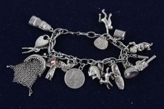 Vintage.  925 Sterling Silver Charm Bracelet W/ Unusual Charms (57g)