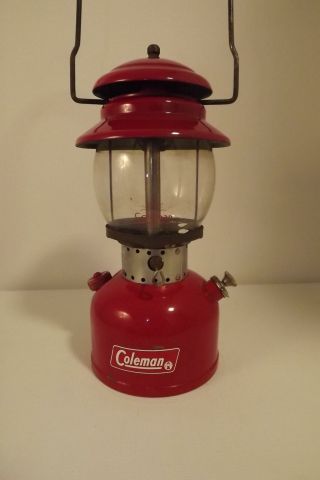 Vintage 02/1968,  Coleman 200 Lantern.  Near Vent,  Red Rising Sun Globe,  Good