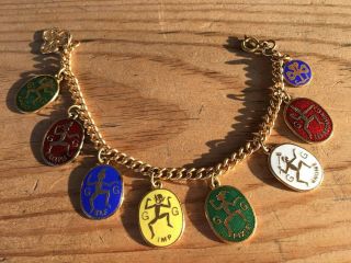 Vintage Girl Guide Charm Bracelet With 9 Coloured Enamel Charms