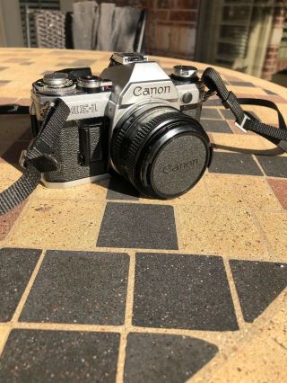 Vintage Canon Ae - 1 35mm Camera,  Canon 50mm Lens Battery And Baffles