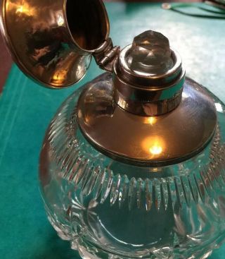 ANTIQUE CUT GLASS WITH SOLID SILVER HINGED TOP PERFUME BOTTLE.  B’HAM 1923.  A511. 2
