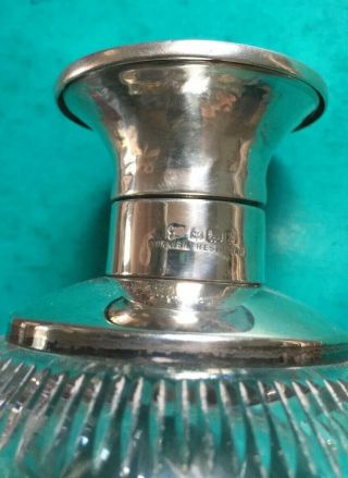 ANTIQUE CUT GLASS WITH SOLID SILVER HINGED TOP PERFUME BOTTLE.  B’HAM 1923.  A511. 3