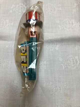 Vintage Uncle Sam Pez dispenser,  no feet,  in wrapper,  perfect 4