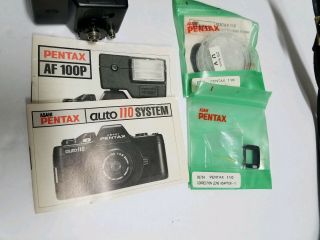 Pentax Auto 110 Film Camera W/ 24mm F/2.  8 lens Case Manuals AF100P Flash Vintage 2