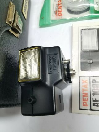 Pentax Auto 110 Film Camera W/ 24mm F/2.  8 lens Case Manuals AF100P Flash Vintage 3