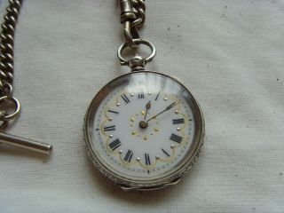 A Silver Pocket Watch And Chain Broken.  Very Old