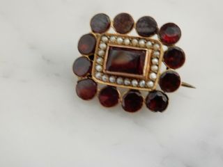 A Victorian Antique 9 Ct Gold Garnet And Seed Pearl Brooch