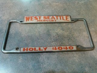 Vintage License Plate Frame.  West Seattle Mercury.  Holly 4040.  Topper.
