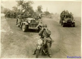Press Photo: Best Wehrmacht Motorcyclist Followed By Motorised Troops; Russia