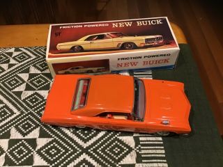 Vintage Asakusa Toy Ltd Japan C 1960s Orange Tin Buick Car Friction Powered