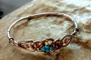 A Victorian Antique 9 Ct Gold Scroll Design Turquoise And Garnet Bangle